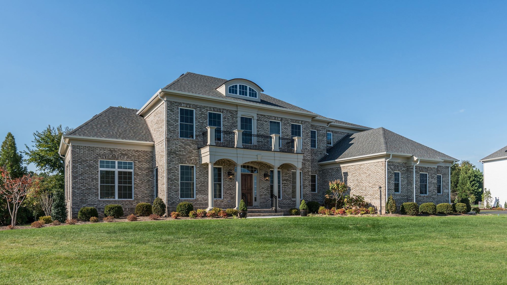 The front elevation of the Grayson on Fallsgate Homesite 4. Some optional features shown.