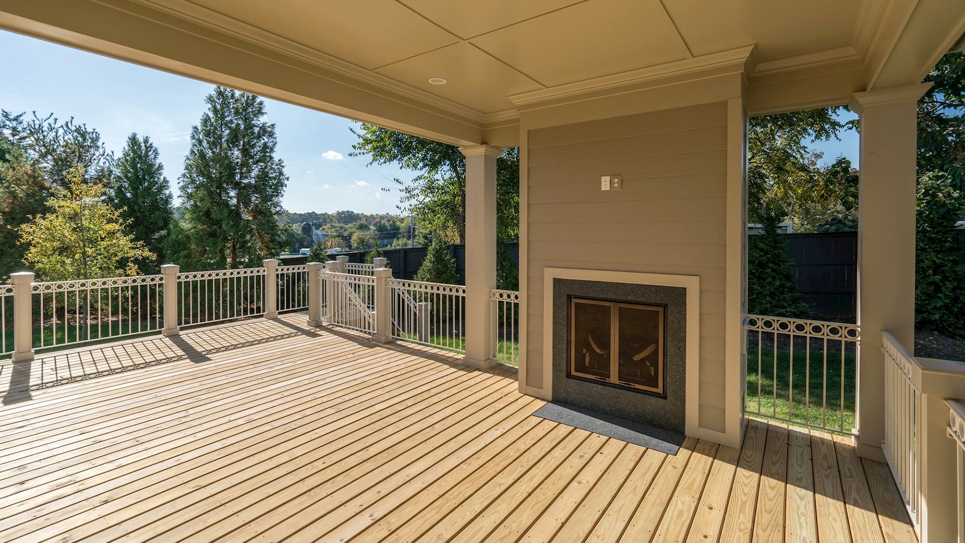 The Custom Lanai (covered deck) in the Grayson on Fallsgate Homesite 4. Some optional features shown.