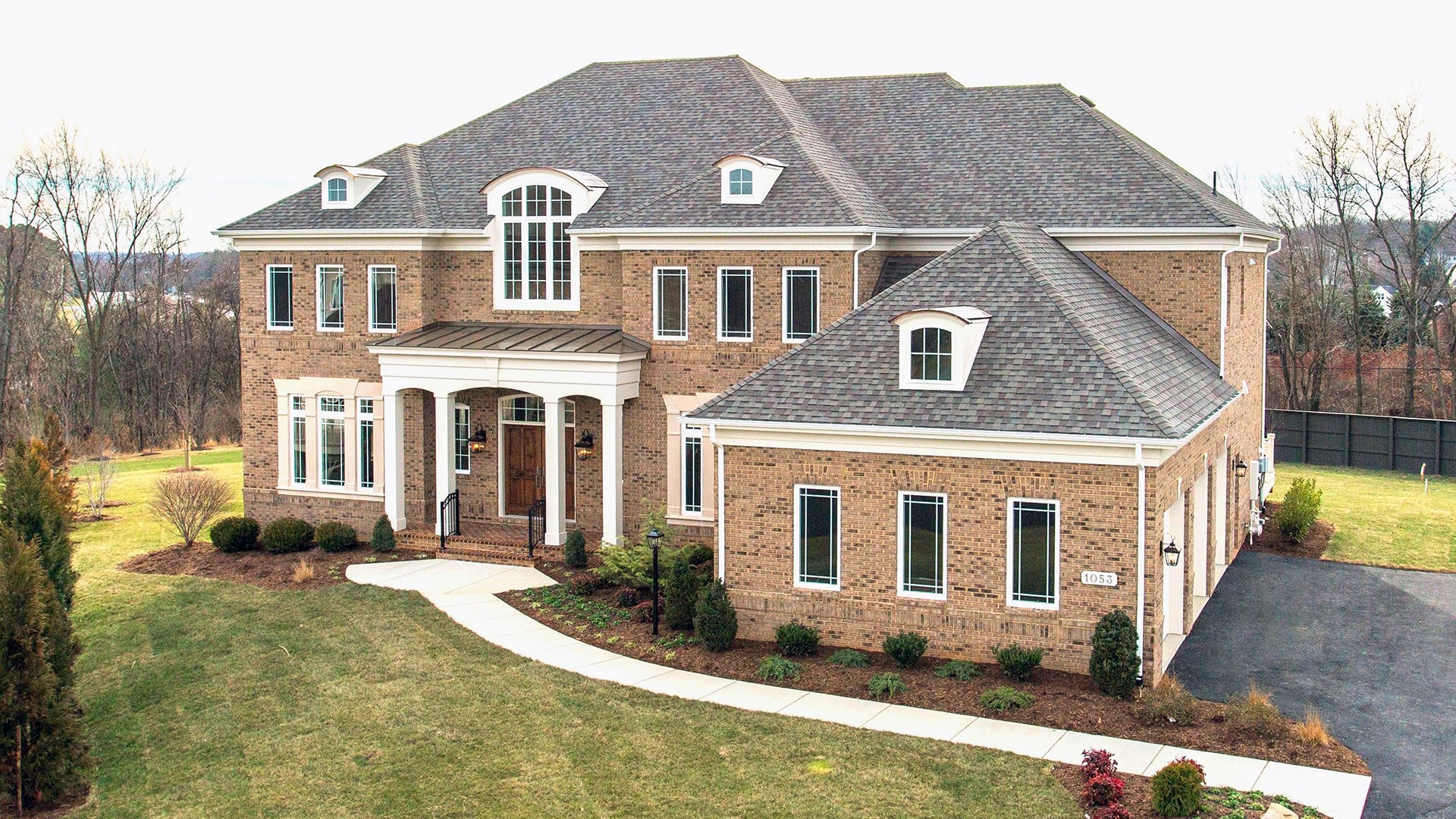 The front elevation of the Winthrop on Fallsgate Homesite 2. Some optional features shown.