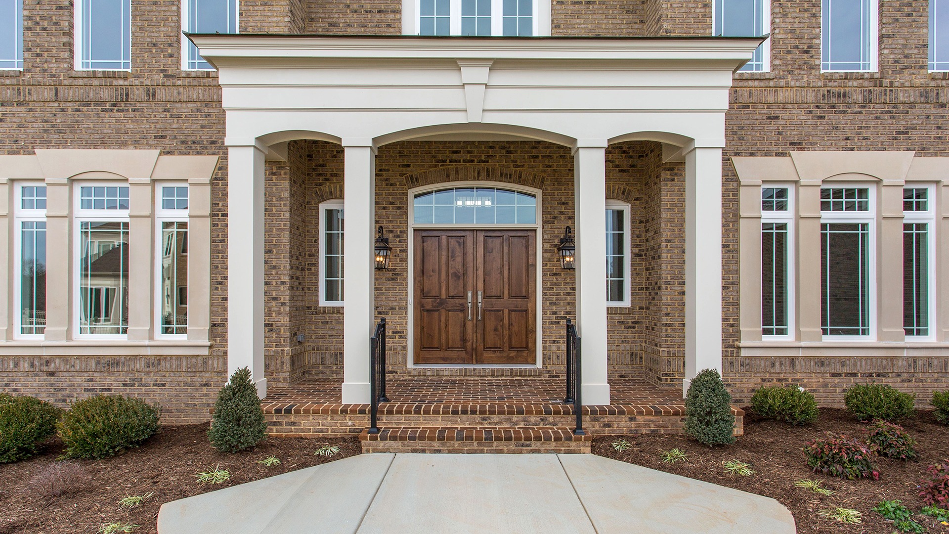 The front door of the Winthrop on Fallsgate Homesite 2. Some optional features shown.