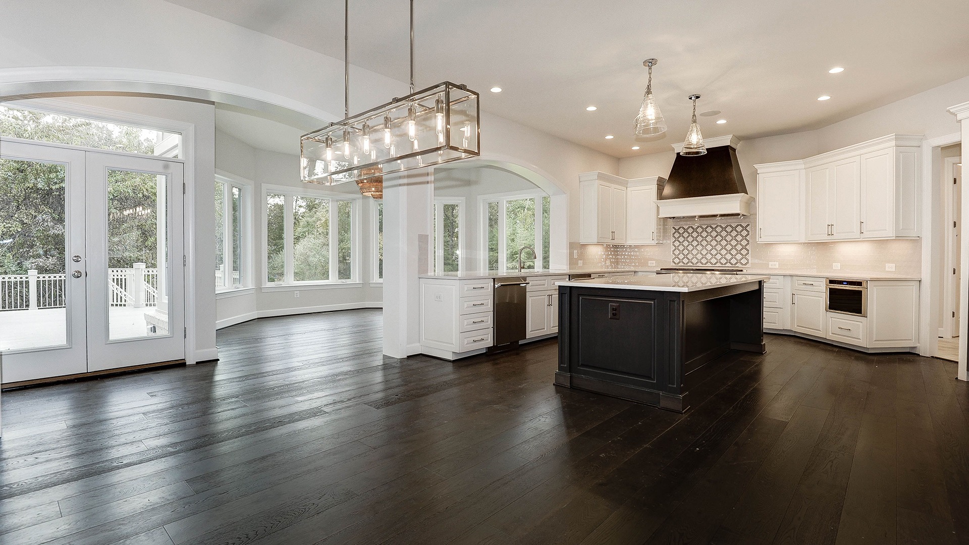 A revised Kitchen with open plan to a naturally lit Sun/Morning Room.