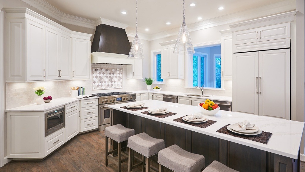 A built-in, cabinet front refrigerator almost disappears in the Kitchen, and a Professional Style Range can make a Kitchen "pop".