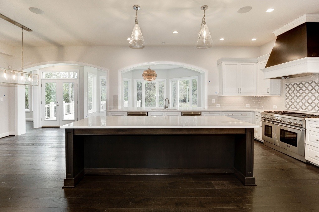 Revised, Open Kitchen with Optional Sunroom. Note: This home is under construction. This photo is of a similar model home, elsewhere.