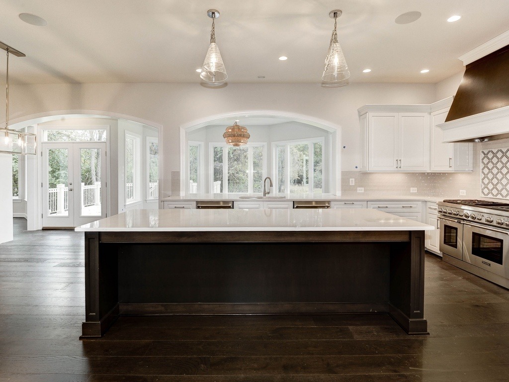 Revised, Open Kitchen with Optional Sunroom. Note: This home is under contruction. This photo is of a similar model home, elsewhere.