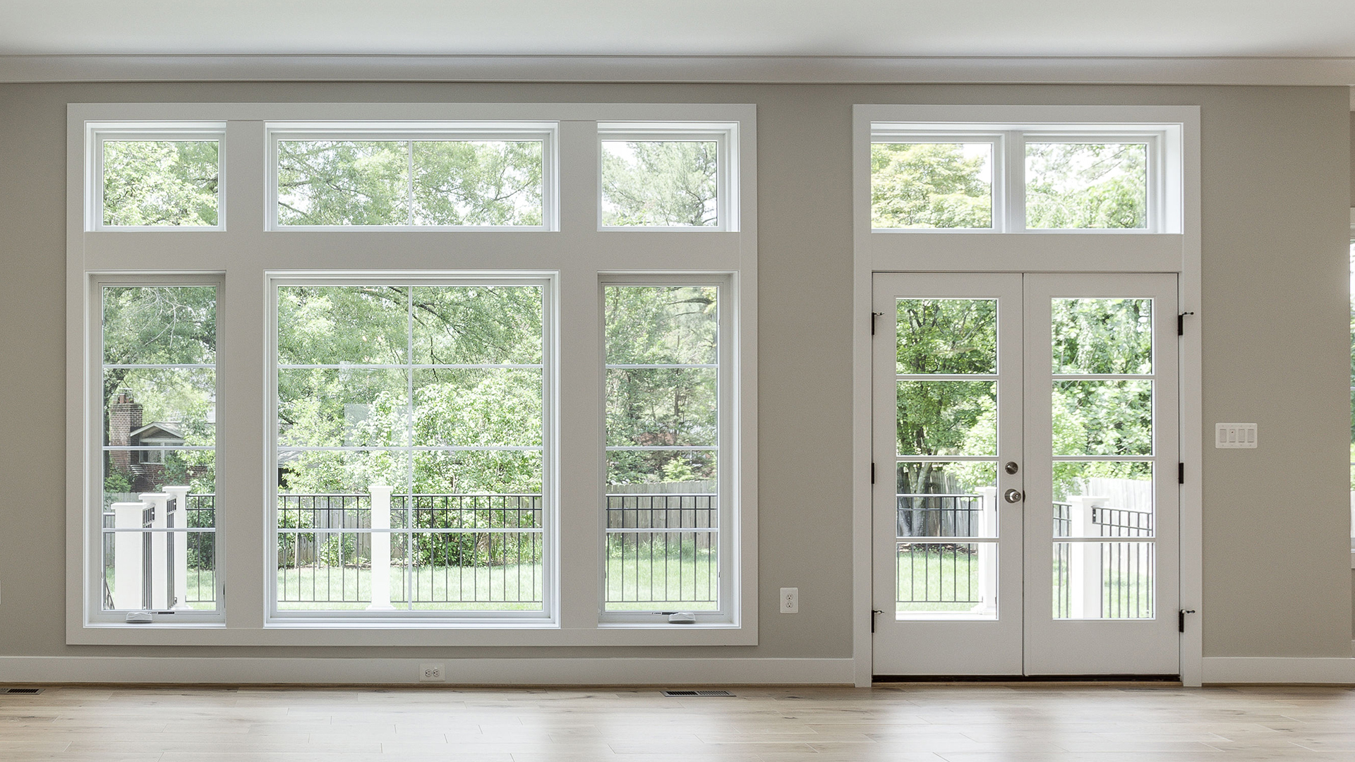 This home has a relatively flat yard, so you can look out into your back yard from the main level.